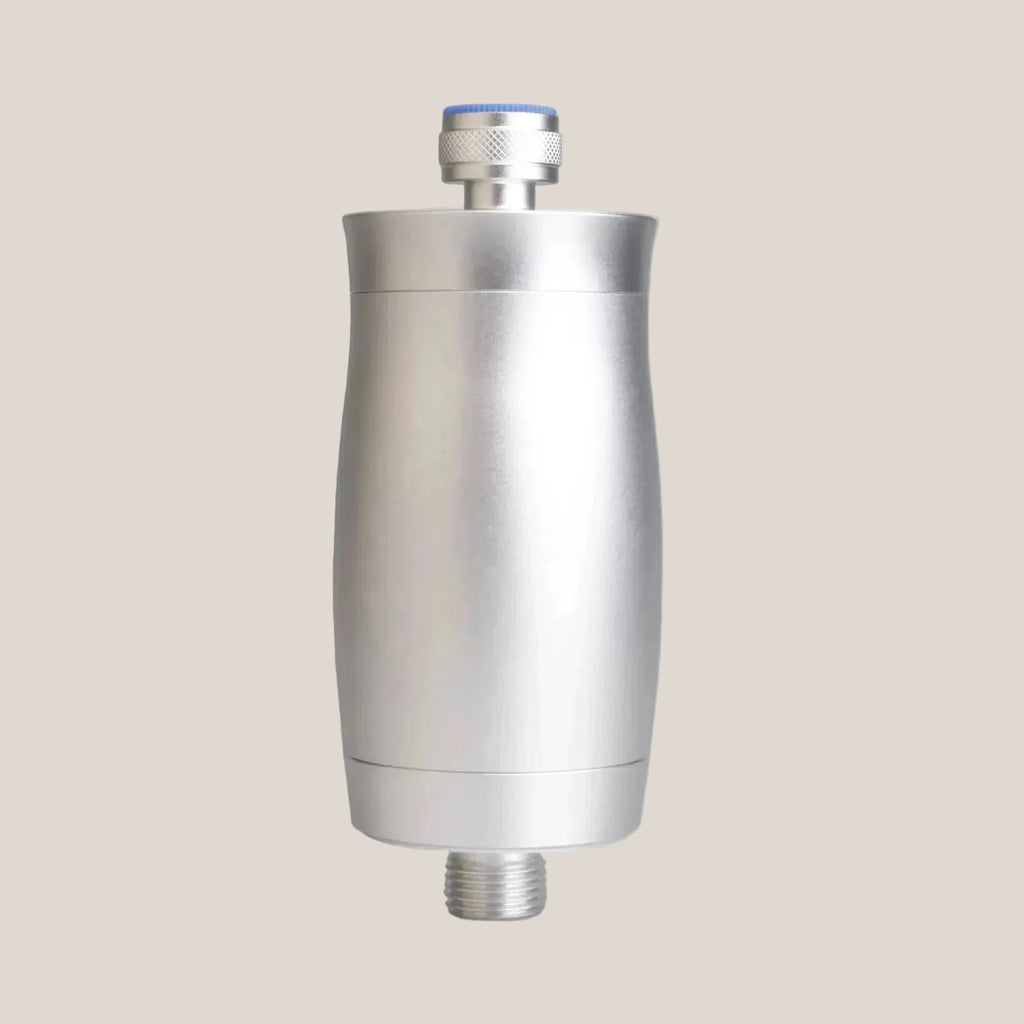 Stainless steel water filter on a white background